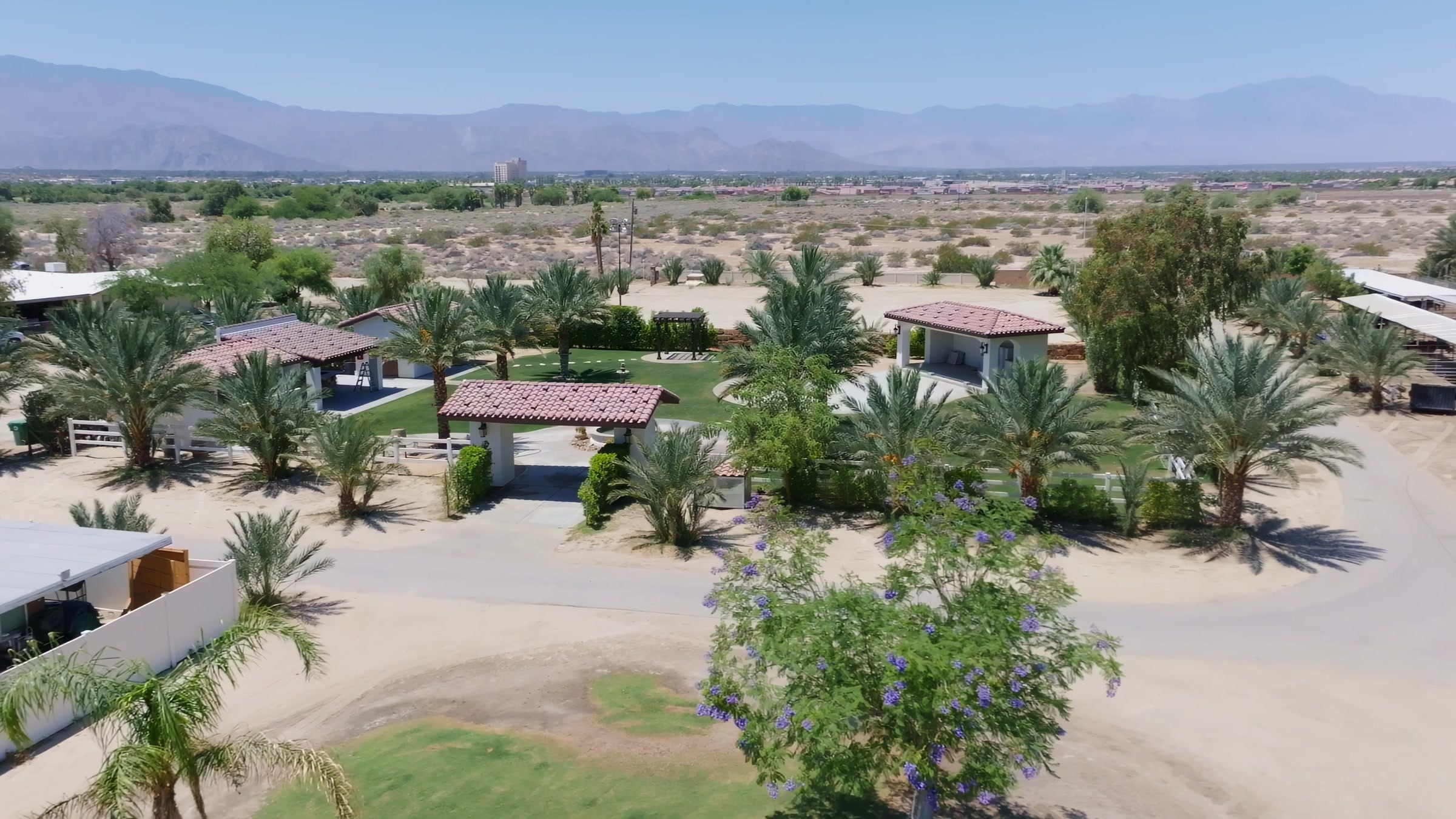Aerial view of Rancho Escondido wedding venue property in Indio, California, showing courtyard, mountains, and surrounding desert